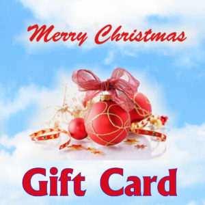 Blue Sky in background, the words Merry Christmas in cursive above a collection of ribbons, ornaments and tinsel in the middle and Gift card written along the bottom